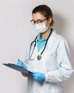 Physician Treating Patient In The Era Of COVID-19